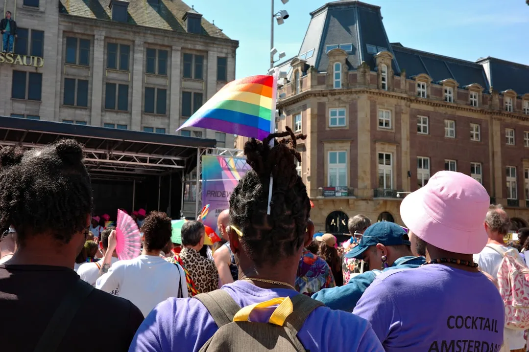 A group of people standing in front of a building